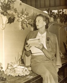 Helen Blaxland judging flower arrangements, c. 1940s photographer unknown