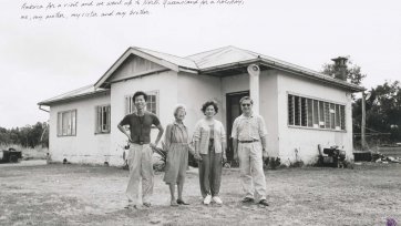 My Family in Front of Our Old Home
