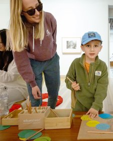 A mother and child playing in the Gallery