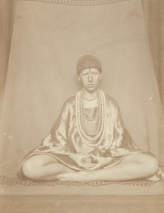 Self portrait (seated cross legged like Buddha) 1927 by Claude Cahun (Lucy Schwob)