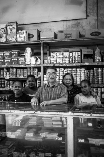 Trade store owners Michael and Justine Cheung and staff, Honiara by Sean Davey