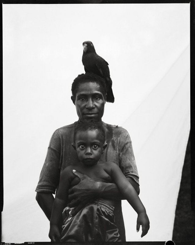 Woman, child and a parrot, 2012