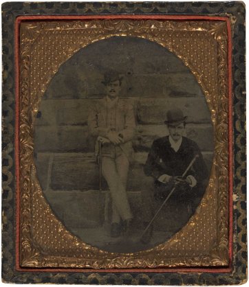 William St Leonards Robertson (standing) beside an unidentified man