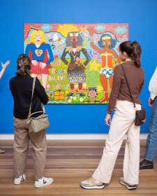 A group of people looking at Do you Believe in Love? 2025 by Kaylene Whiskey A group of people looking at Do you Believe in Love? 2025 by Kaylene Whiskey