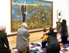 Children and parent in front of the portrait Dr Brown and Green Old Time Waltz