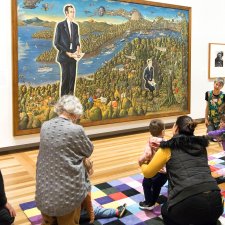Children and parent in front of the portrait Dr Brown and Green Old Time Waltz