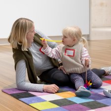 A mother and daughter participating in Portrait Play