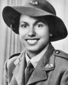 Studio portrait of servicewoman Lance Corporal Kathleen Jean Mary (Kath) Walker, c.1942 