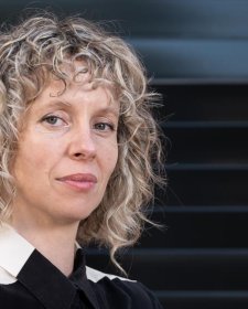 Bree Pickering standing in front of a colourful wall