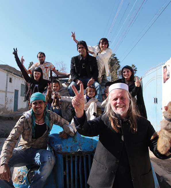 Gittoes with members of the Yellow House travelling through Afghanistan’s countryside in 2013