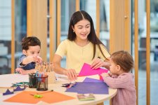 Childlren at a table with craft activities