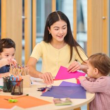 Childlren at a table with craft activities