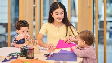 Childlren at a table with craft activities