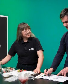 Presenters from the National Portrait Gallery and Questacon presenter with strawberries on a table