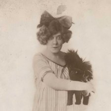 Miss Florrie Ford (Christmas pantomime with toy cat)