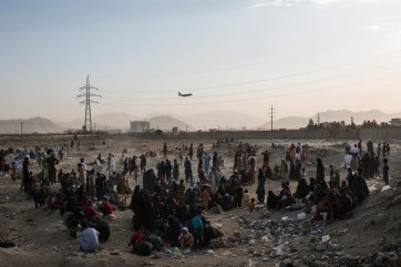 Thousands of Afghans hoping to enter the airport waited day and night outside a gate controlled by a notorious CIA-controlled Afghan militia, 2021 Andrew Quilty