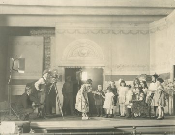 Louise Lovely with children during production of A Day in the Studio, c.1922 Unknown photographer
