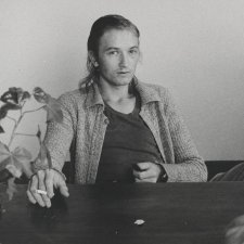 Esben Storm sitting at a table, c. 1976 Carol Jerrems