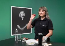 A Questacon presenter holds a strawberry