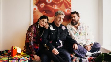 Romance Was Born designers Anna Plunkett and Luke Sales with artist Samuel Hodge (centre)
 Photo: Daniel Goode