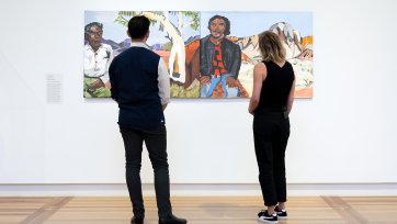 People viewing an artwork in the Gallery