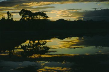 Sunset is reflected in the Lake Pedder waters as a storm approaches, Tasmania, 1971 Olegas Truchanas