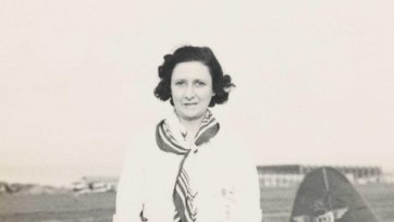 Mrs Bonney flying from Australia to South Africa via Siam. Singapore 1937 (full length portrait)