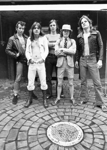 AC/DC (Bon Scott, Malcolm Young,  Phil Rudd, Angus Young, Mark Evans) at Parker’s studio, Fitzroy, 1975 David Parker